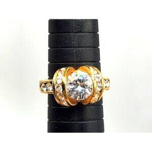 Gold Plated Ring With Knot Design Holding Large CZ Center Stone - Size 9 1/2"